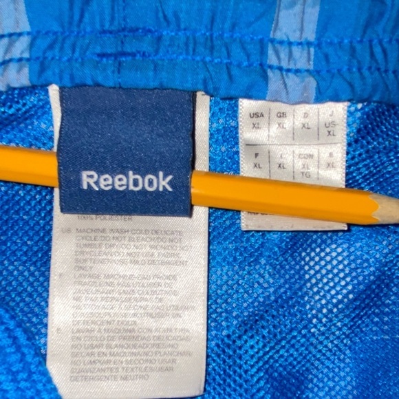 Reebok swim trunks in classic blue plaid. Board shorts dry fast and look sharp. - Picture 3 of 4